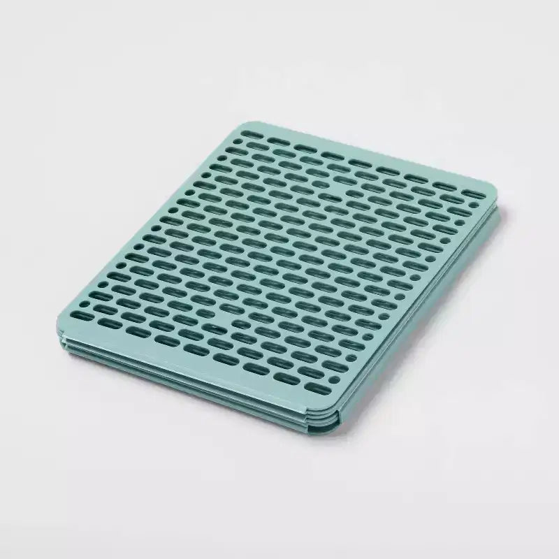 Planche à plier les vêtements avec guide graphique de pliage, fabriquée à partir de plastique recyclé