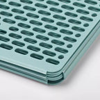 Planche à plier les vêtements avec guide graphique de pliage, fabriquée à partir de plastique recyclé