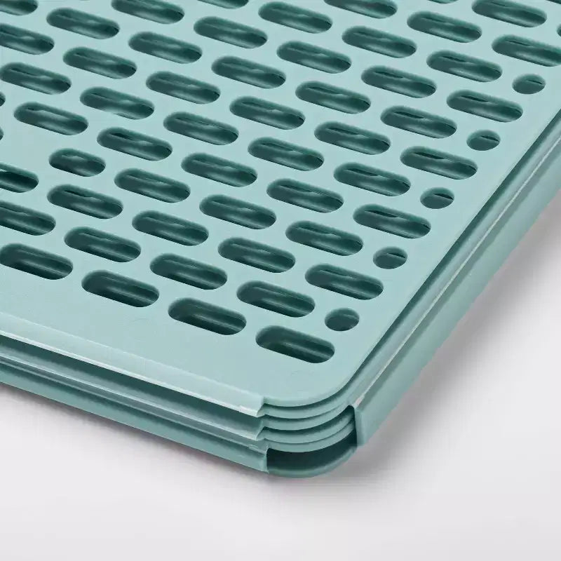 Planche à plier les vêtements avec guide graphique de pliage, fabriquée à partir de plastique recyclé