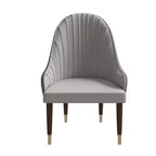 Chaise de salle à manger à dossier haut, dossier ondulé en similicuir, cadre en bois d'hévéa et accents dorés, 150 kg