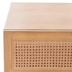 Table basse en bois avec 2 tiroirs et façade en cannage de rotin, pieds fuselés, supporte 68 kg